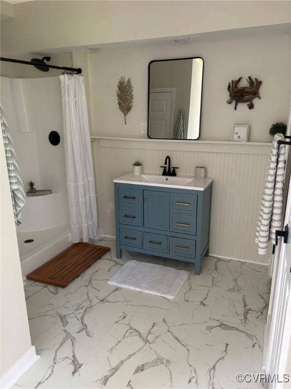 111 New South Road Kilmarnock, VA 22482 - Photo 9 of 32 Full bath with marble look tile flooring, vanity,