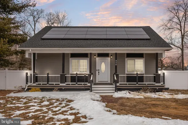 a front view of a house with a couch