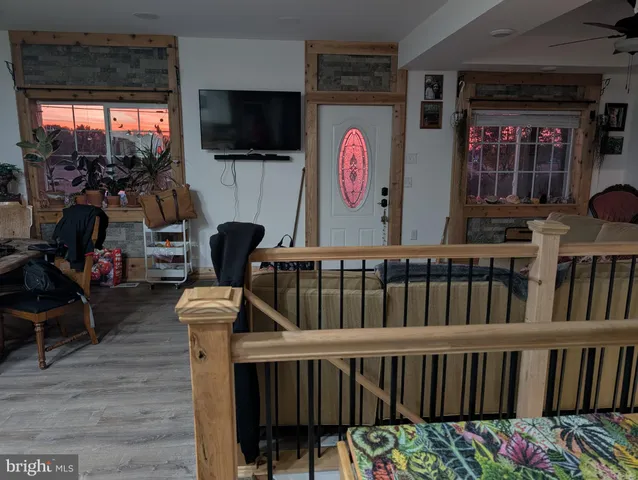 workspace with wooden floor and windows