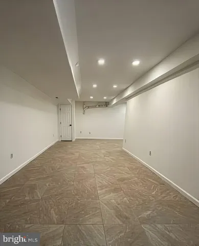 an empty room with a natural light