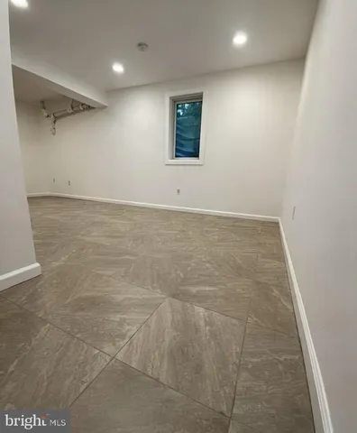 a bathroom with a sink a vanity and mirror