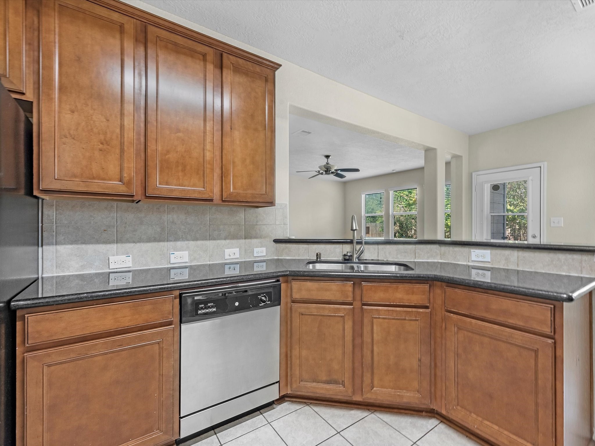 13307 Bomoseen Lake Road Houston, TX 77044 - Photo 14 of 40 a kitchen with cabinets appliances and a sink