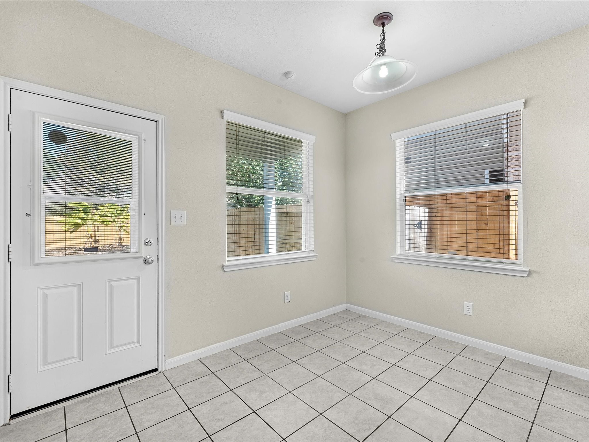 13307 Bomoseen Lake Road Houston, TX 77044 - Photo 16 of 40 a view of an empty room with window