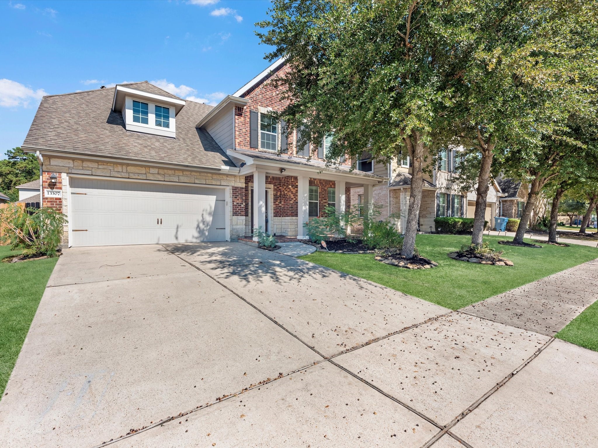 13307 Bomoseen Lake Road Houston, TX 77044 - Photo 2 of 40 front view of a house with a yard