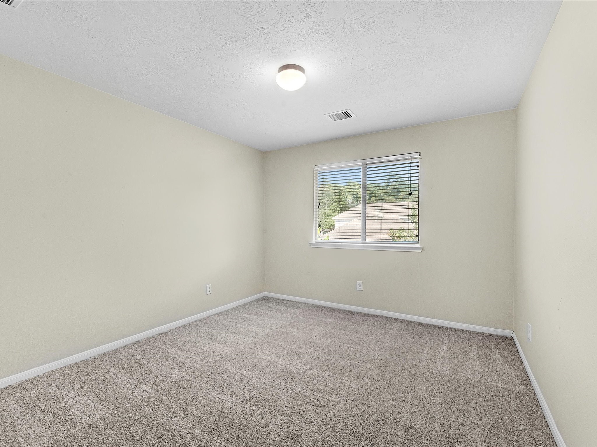 13307 Bomoseen Lake Road Houston, TX 77044 - Photo 28 of 40 an empty room with windows