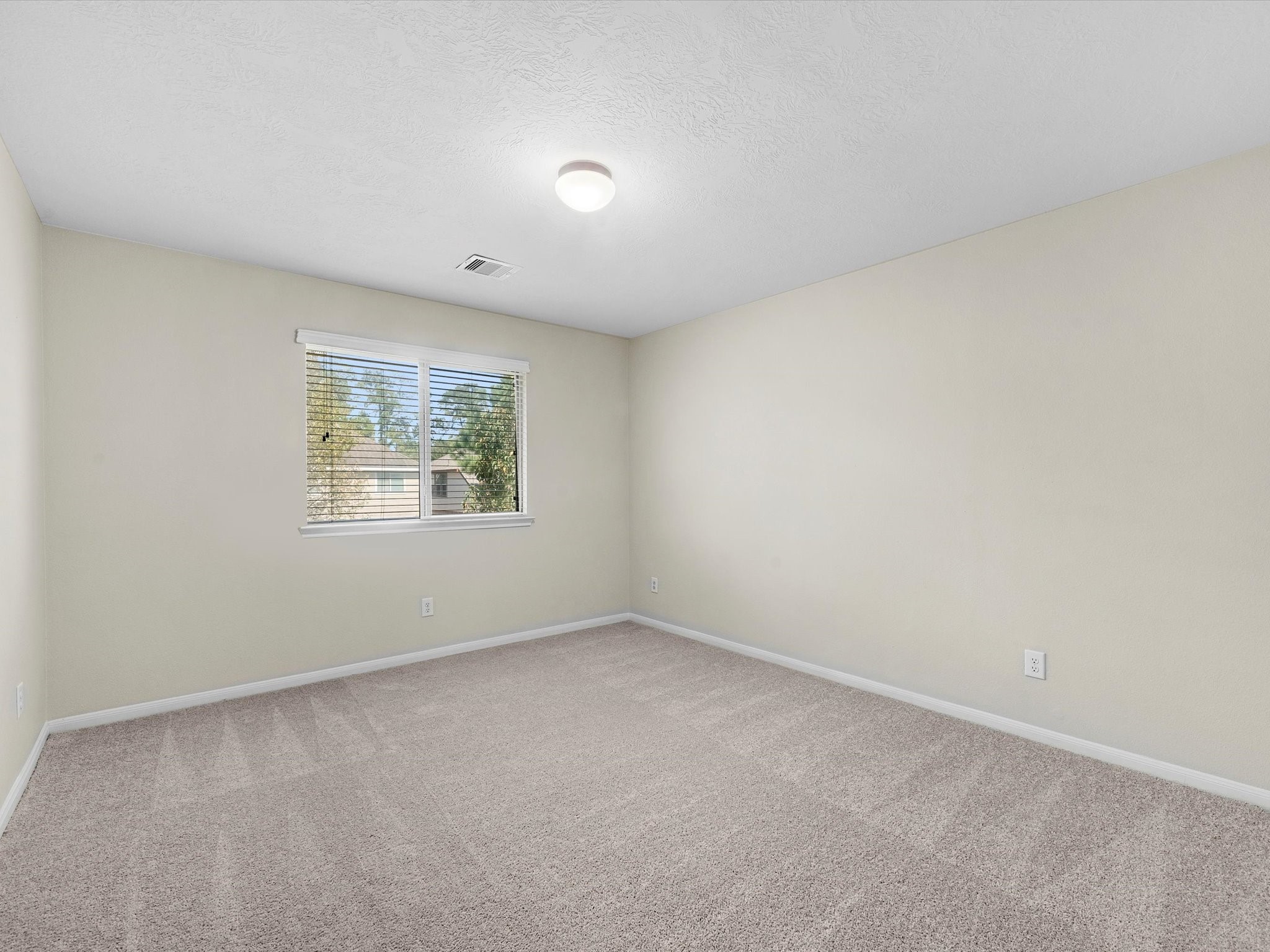 13307 Bomoseen Lake Road Houston, TX 77044 - Photo 30 of 40 an empty room with a window