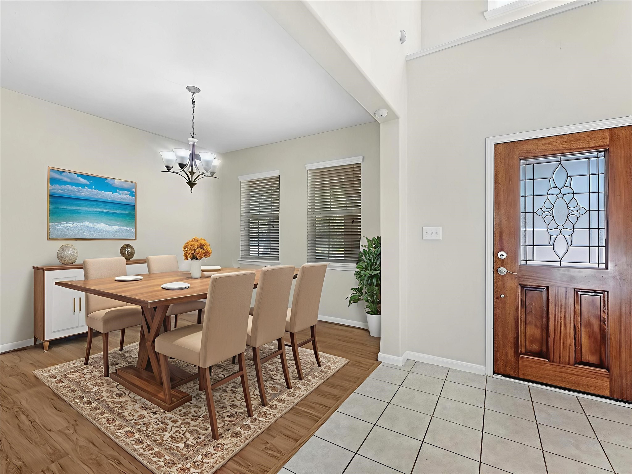 13307 Bomoseen Lake Road Houston, TX 77044 - Photo 3 of 40 a view of a dining room with furniture window and wooden floor