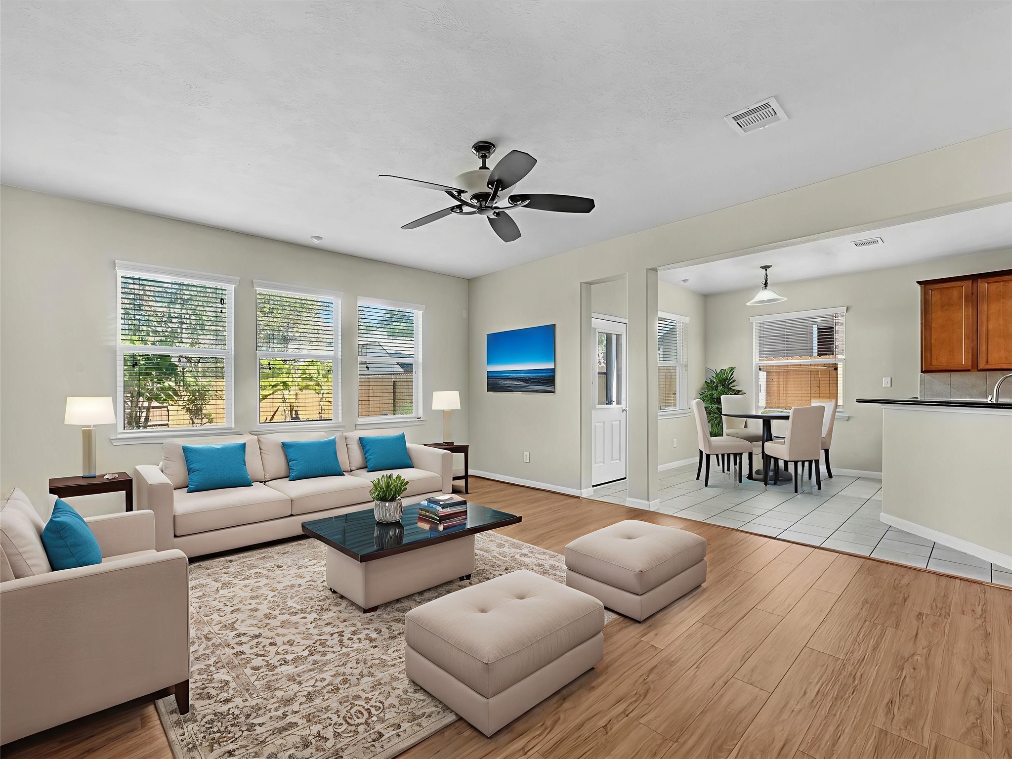 13307 Bomoseen Lake Road Houston, TX 77044 - Photo 4 of 40 a living room with furniture and a wooden floor