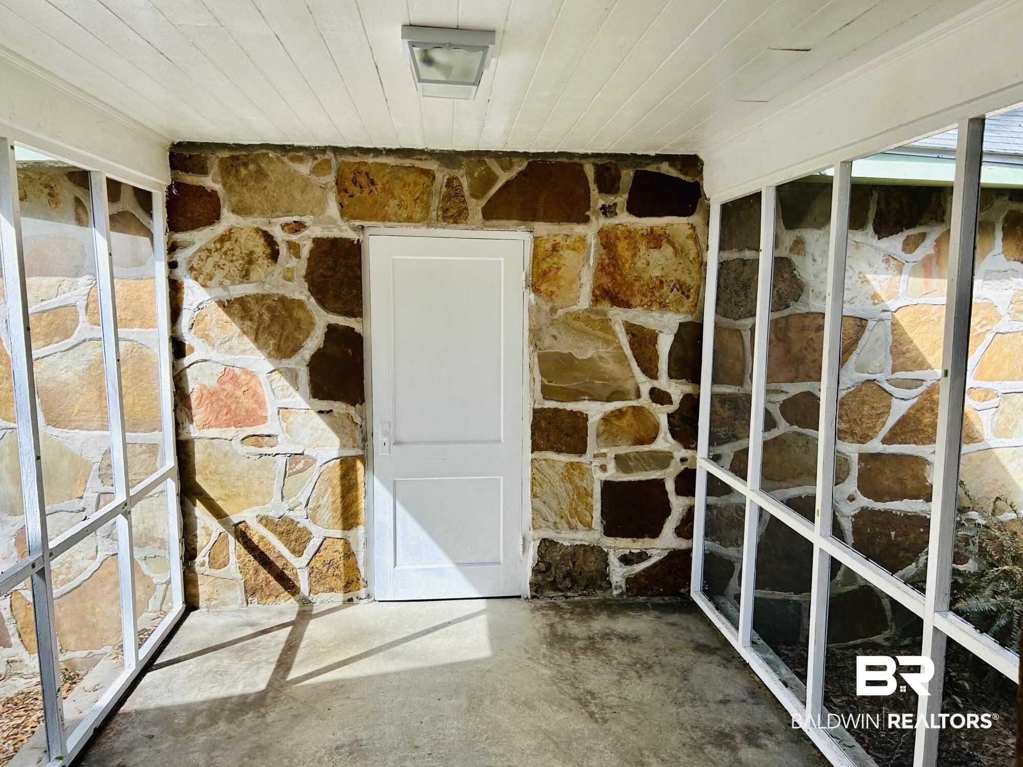 94 Diamond Street Mobile, AL 36611 - Photo 21 of 30 Unfurnished sunroom featuring wooden ceiling