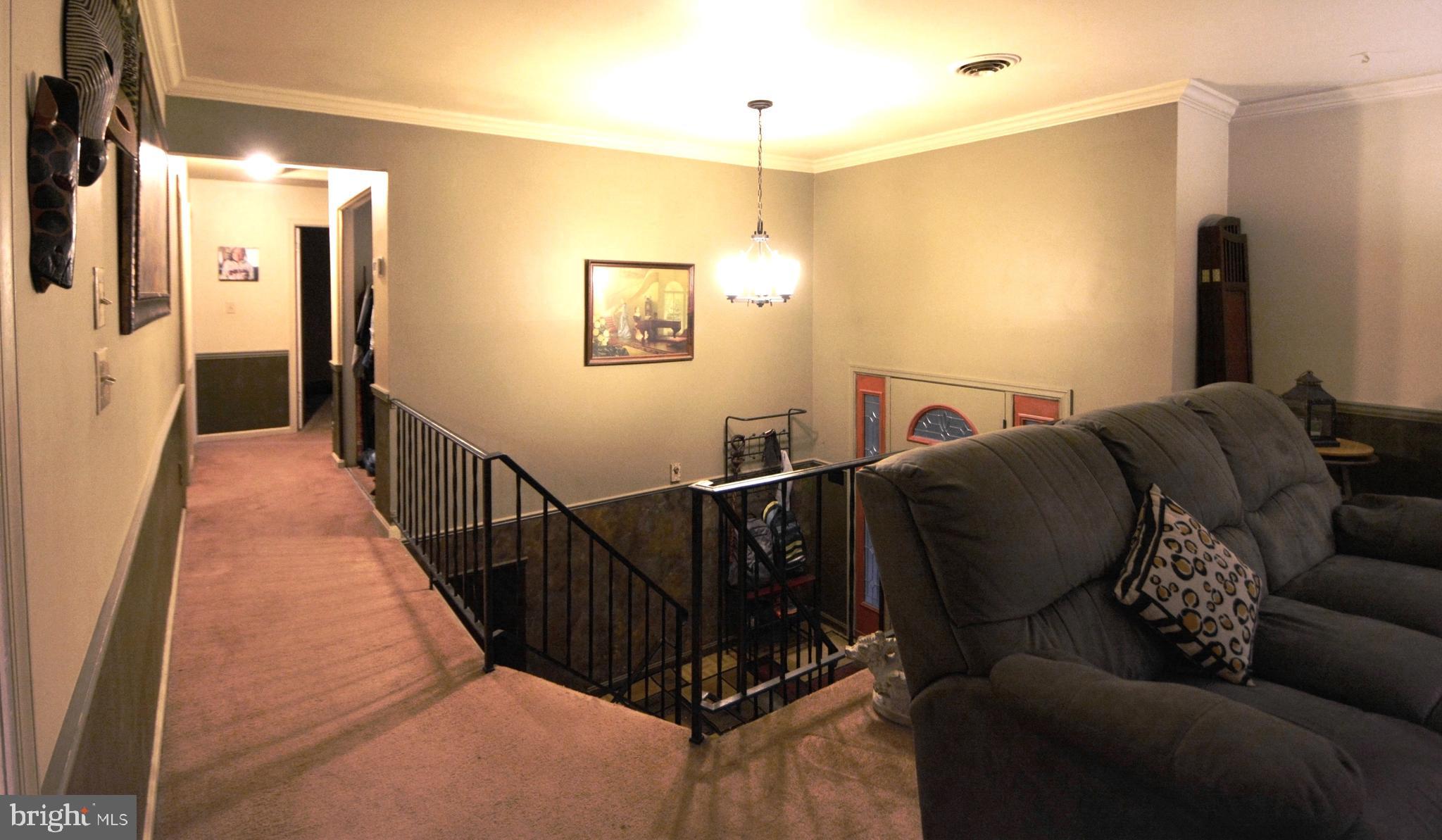 5421 Ridge Road Mount Airy, MD 21771 - Photo 19 of 72 Comtemporary open foyer with crown molding.