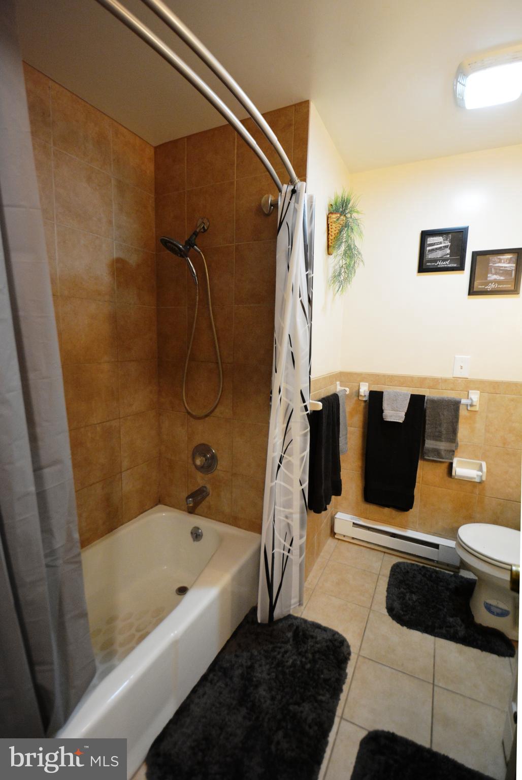 5421 Ridge Road Mount Airy, MD 21771 - Photo 31 of 72 Bathroom 1 , hall bath remodeled tile surround.