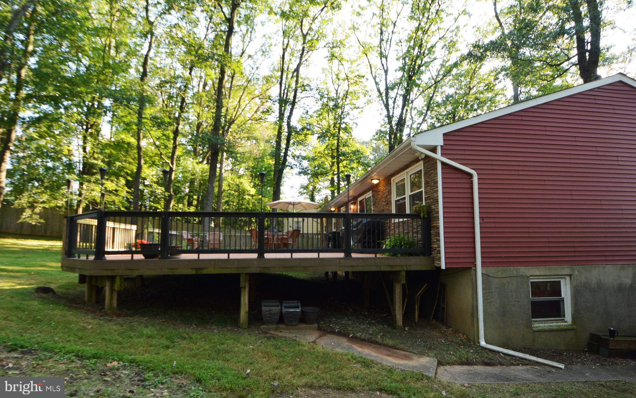 5421 Ridge Road Mount Airy, MD 21771 - Photo 60 of 72 Left side view of deck & garage window.