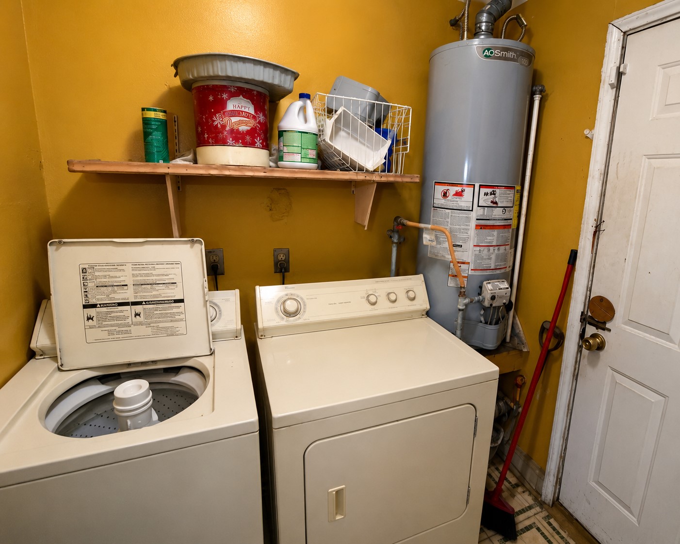3727 Yosemite Street Houston, TX 77021 - Photo 9 of 15 a utility room with dryer and washer