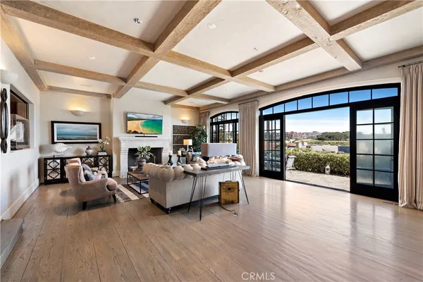 a view of a terrace with couches and city view