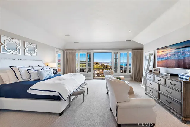 a living room with furniture and flowers