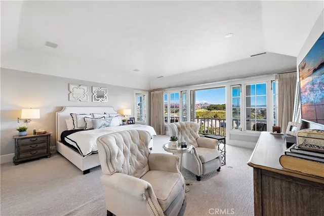 a living room with furniture a dining table and chairs with kitchen view