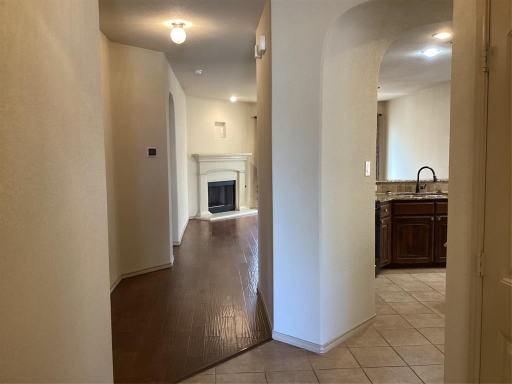 10213 Point Lobos Trail Fort Worth, TX 76177 - Photo 3 of 29 a view of a kitchen from the hallway