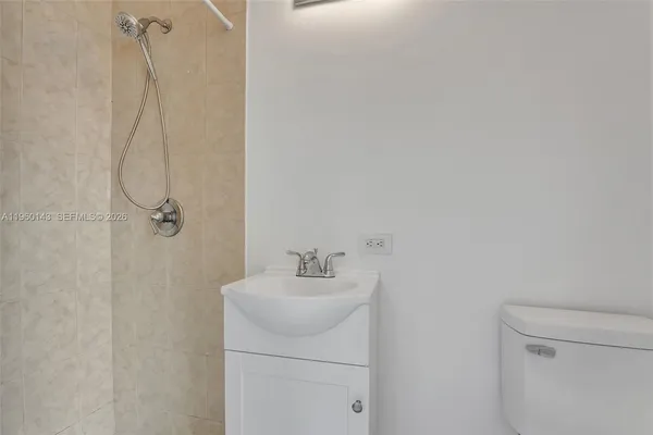 a utility room with cabinets