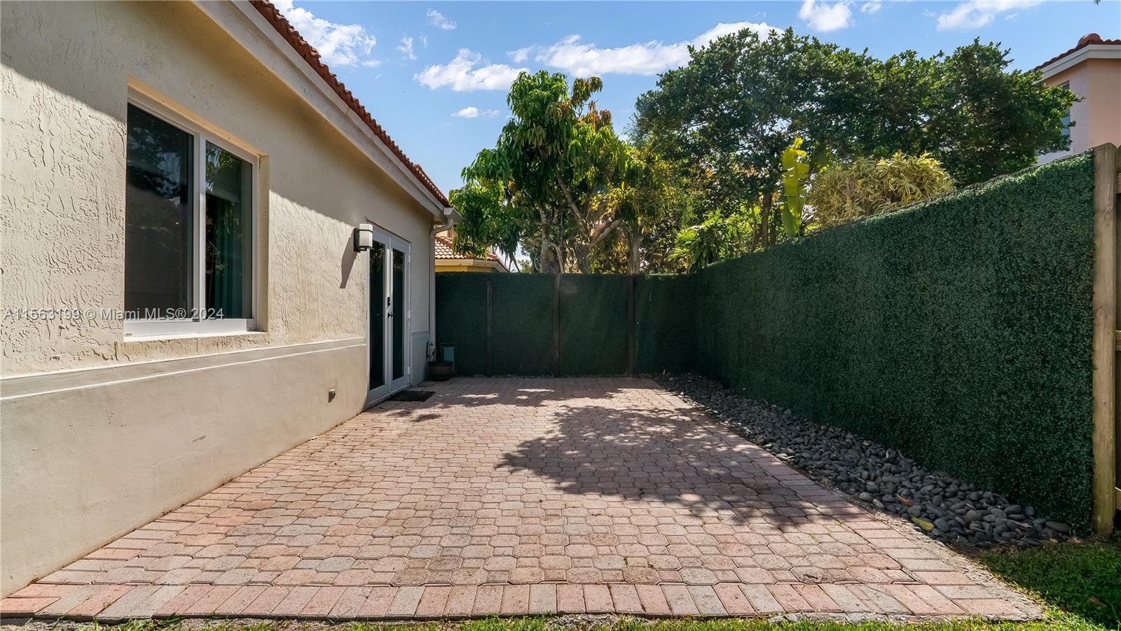 11272 Roundelay Road Cooper City, FL 33026 - Photo 42 of 47 a view of a backyard of the house