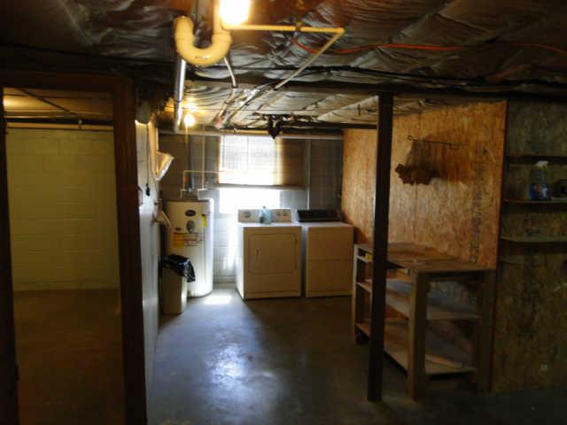 227 Hampton Road Columbia, TN 38401 - Photo 17 of 20 Laundry in basement and storage room to left