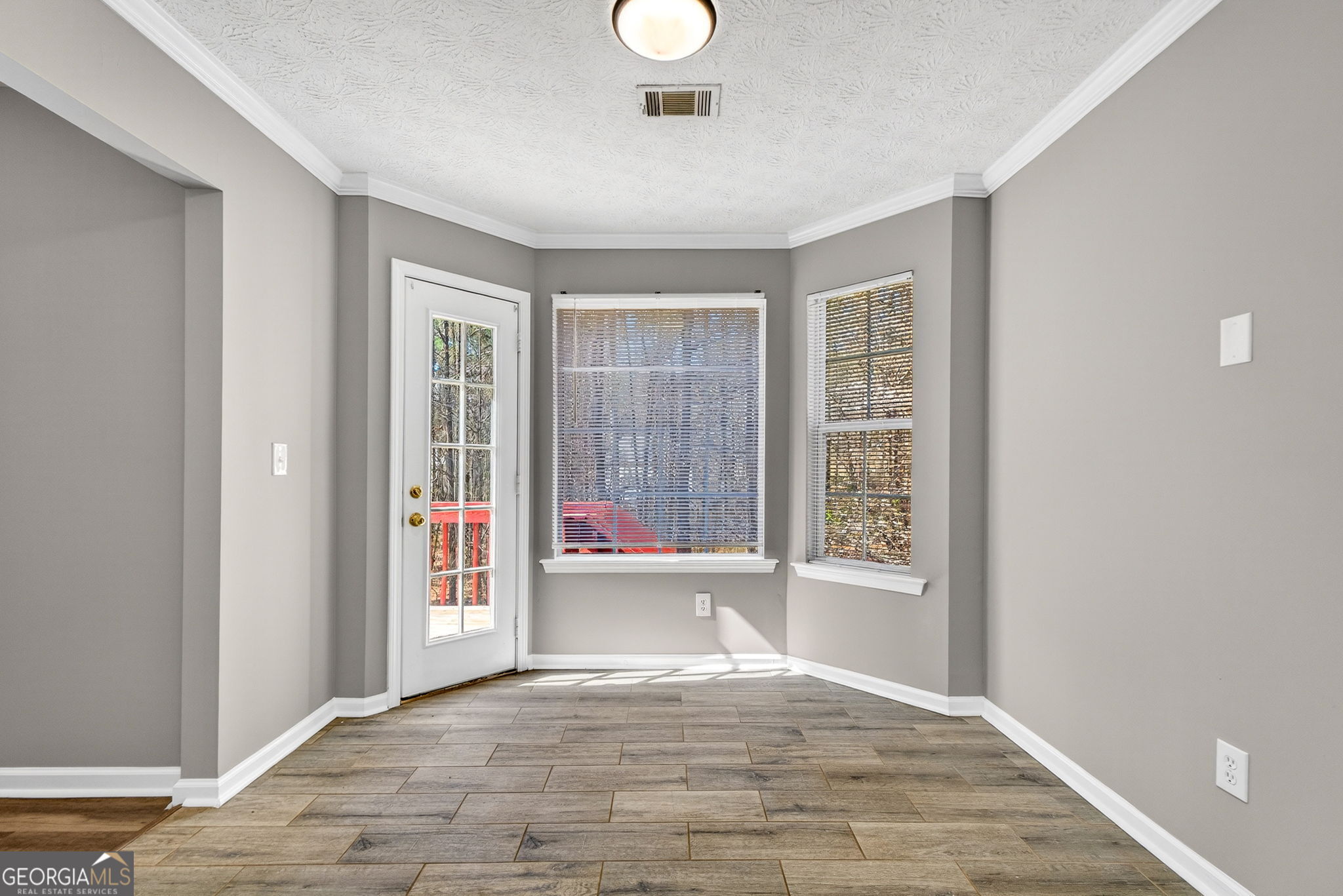 224 Stillwater Court Hampton, GA 30228 - Photo 21 of 44 a view of an empty room with a window