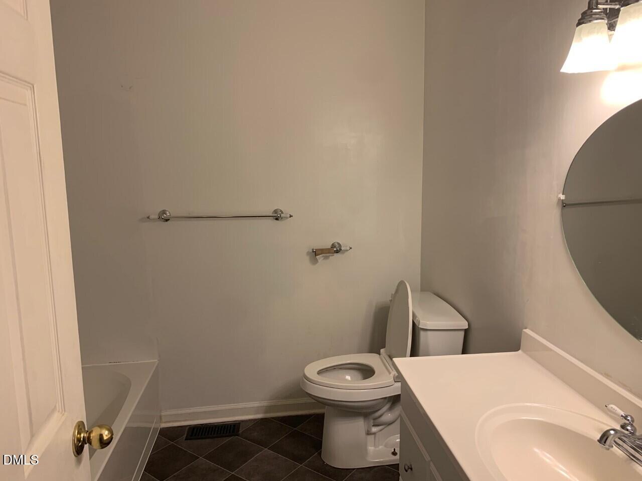 204 Shaw's Pond Road Four Oaks, NC 27524 - Photo 11 of 13 204 Shaws Pond Road hall bath