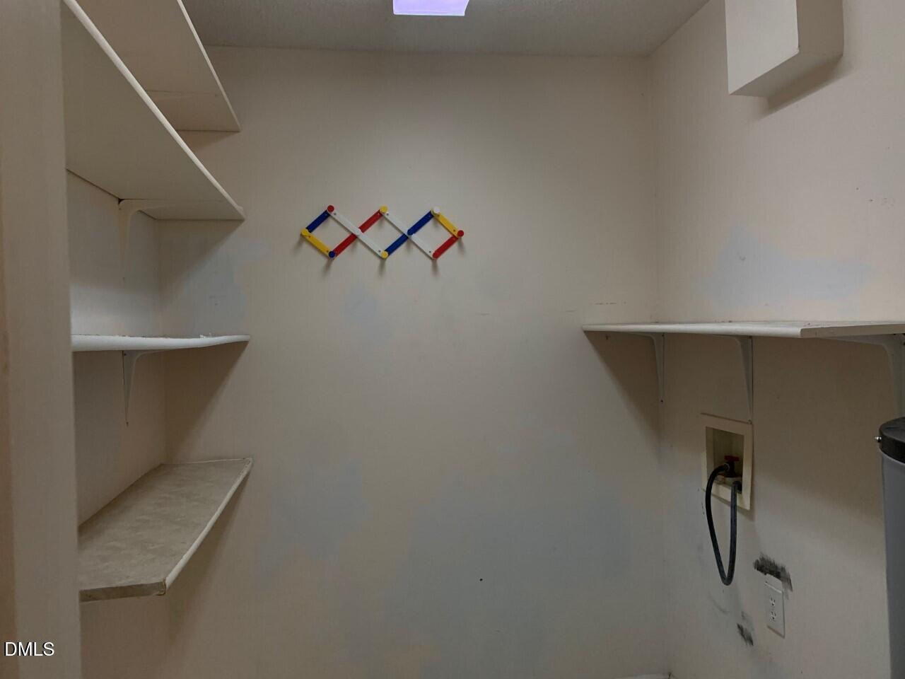 204 Shaw's Pond Road Four Oaks, NC 27524 - Photo 12 of 13 204 Shaws Pond Road laundry