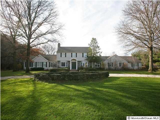 105 Bucks Mill Road Colts Neck, NJ 07722 - Photo 1 of 3 a house view with a garden space