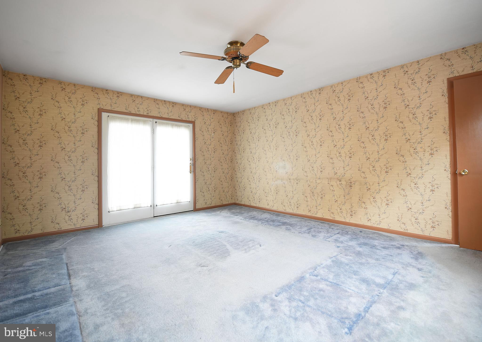 13524 Bottom Road Hydes, MD 21082 - Photo 36 of 64 Family room 1, sliding doors.