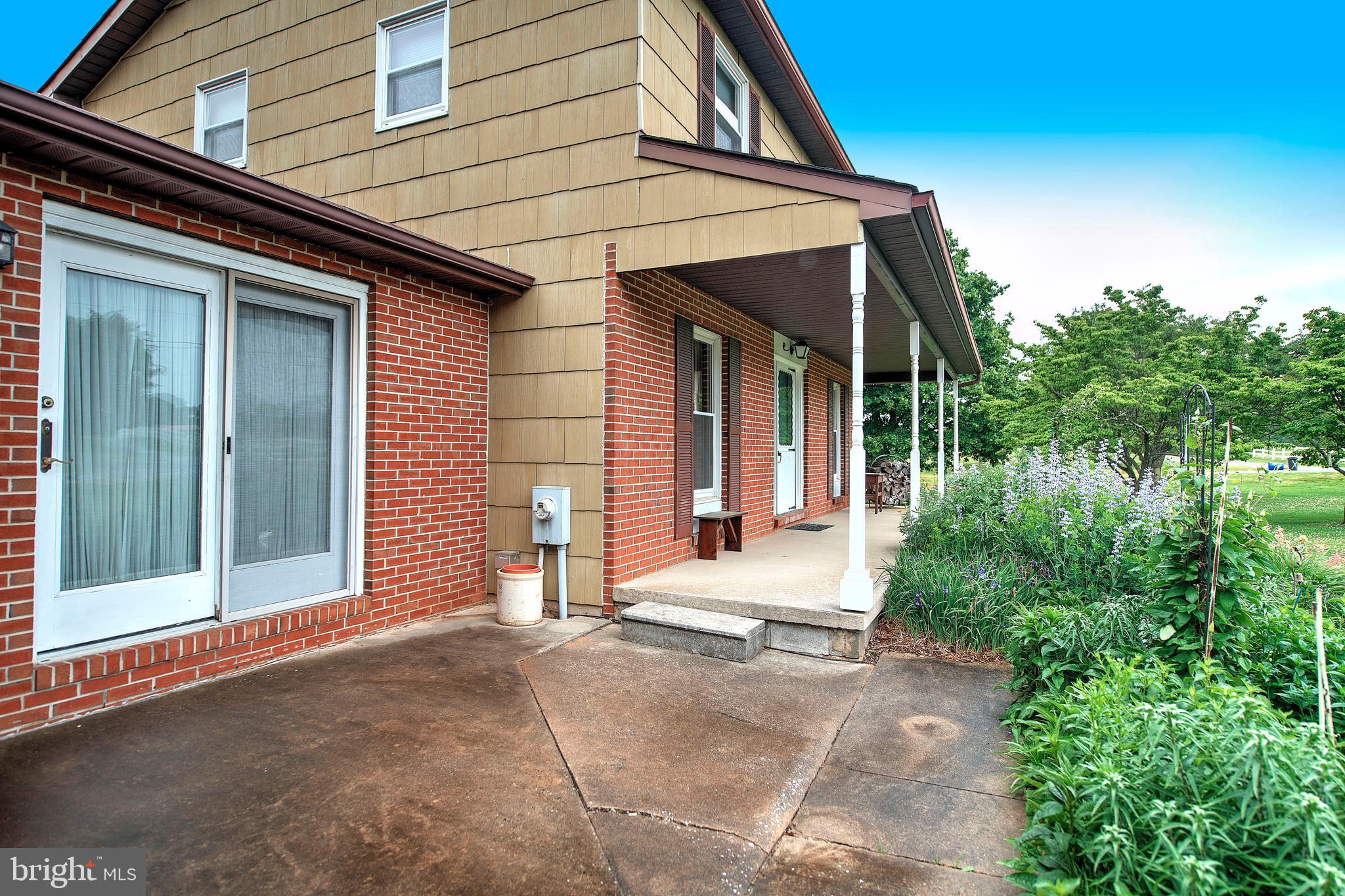 13524 Bottom Road Hydes, MD 21082 - Photo 60 of 64 Front porch and patio!