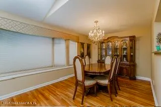 a kitchen with a sink cabinets and stainless steel appliances