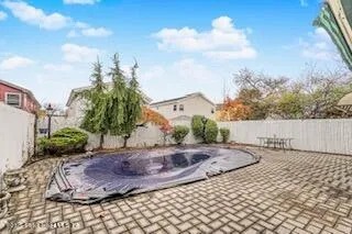a utility room with sink dryer and washer