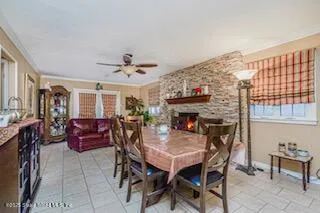 a view of a dining room with furniture