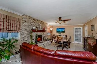 a view of a living room and dining room