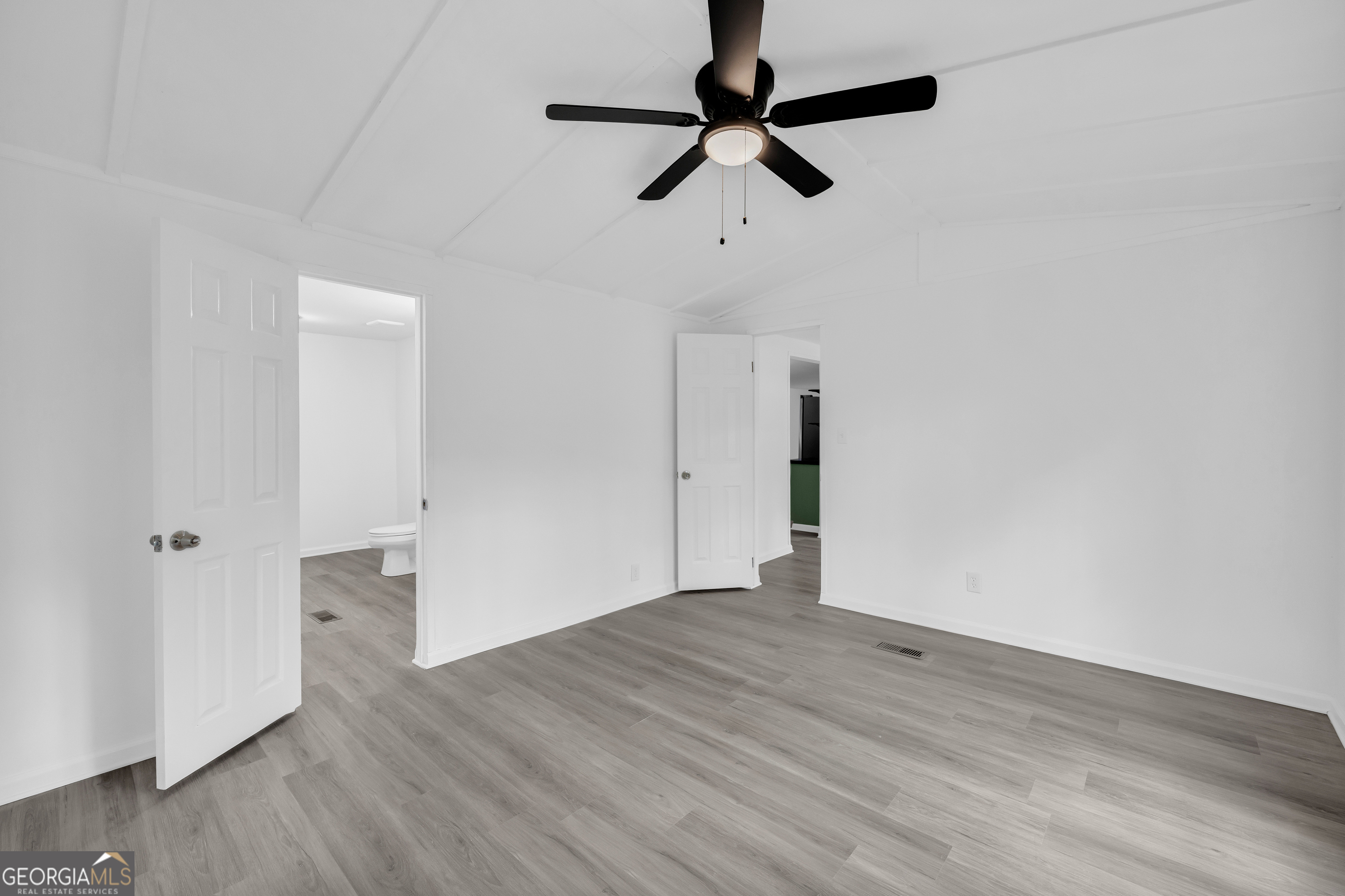 1144 Wolfskin Road Arnoldsville, GA 30619 - Photo 12 of 41 wooden floor in an empty room