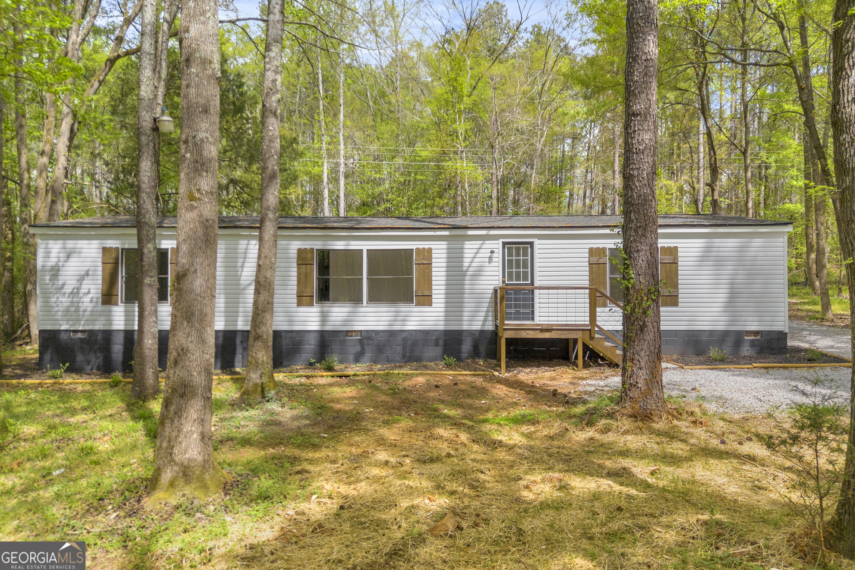 1144 Wolfskin Road Arnoldsville, GA 30619 - Photo 2 of 41 front view of a house with a yard