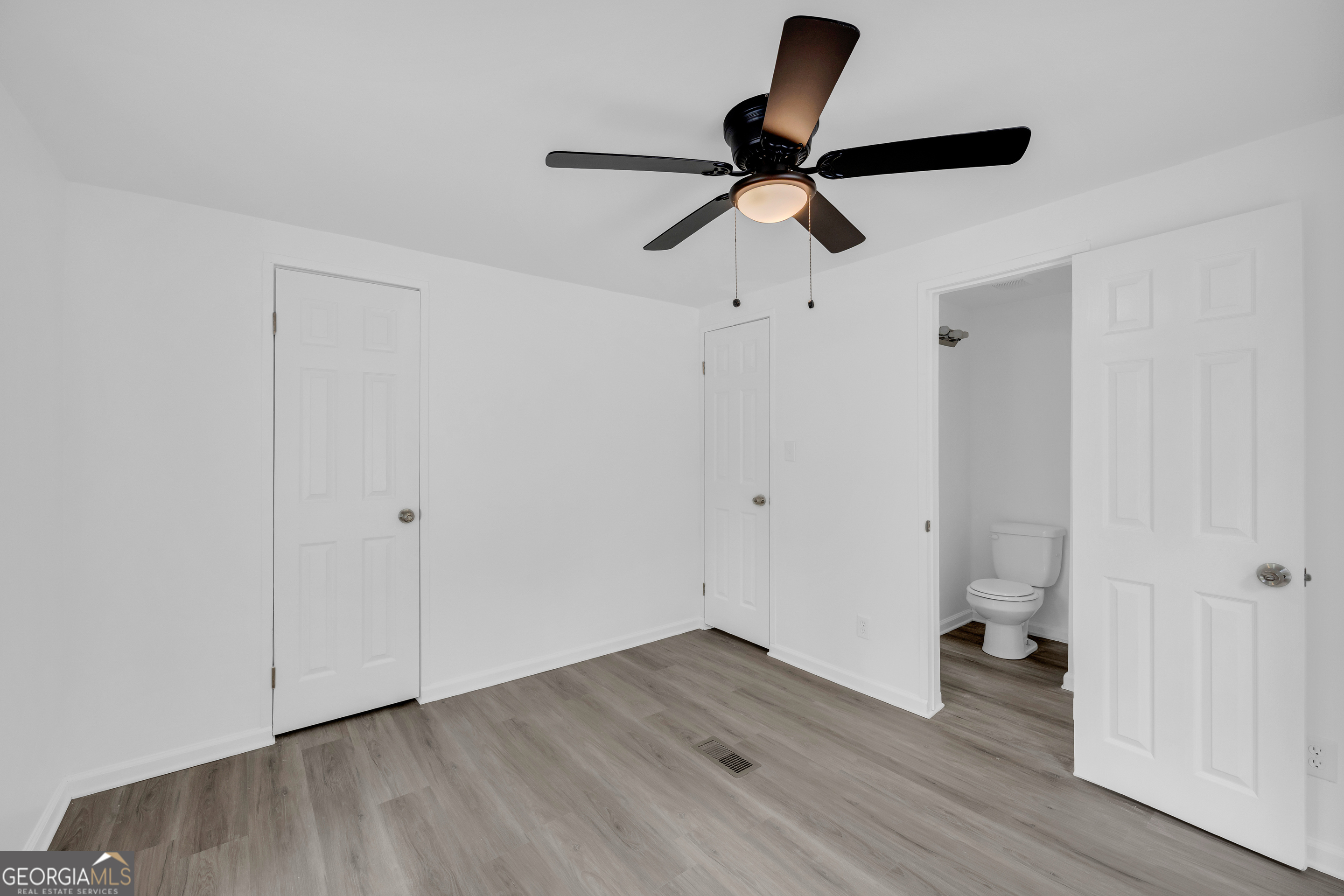 1144 Wolfskin Road Arnoldsville, GA 30619 - Photo 28 of 41 a view of empty room with wooden floor