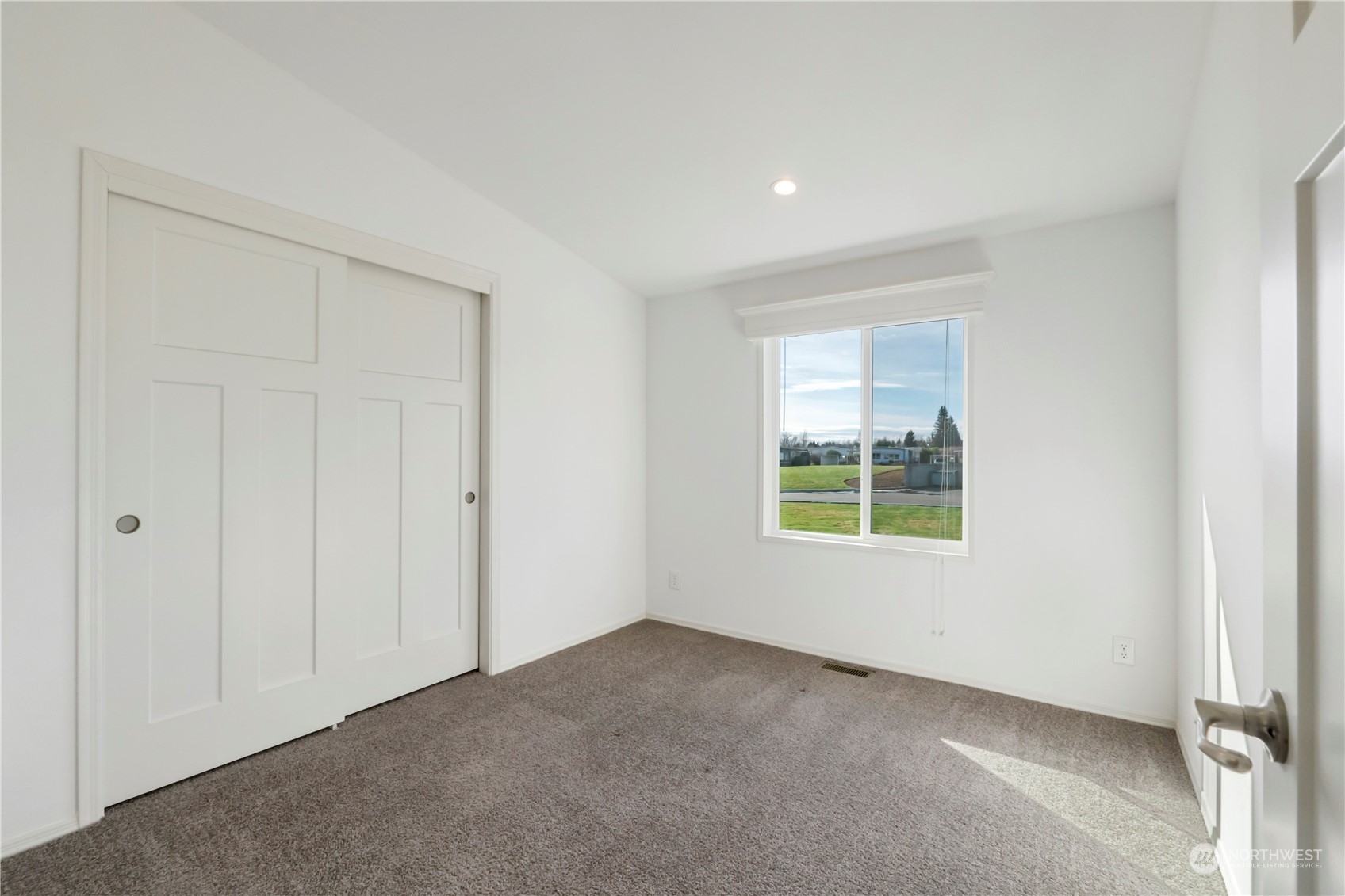 943 Pine Drive Enumclaw, WA 98022 - Photo 14 of 21 a view of an empty room with a window