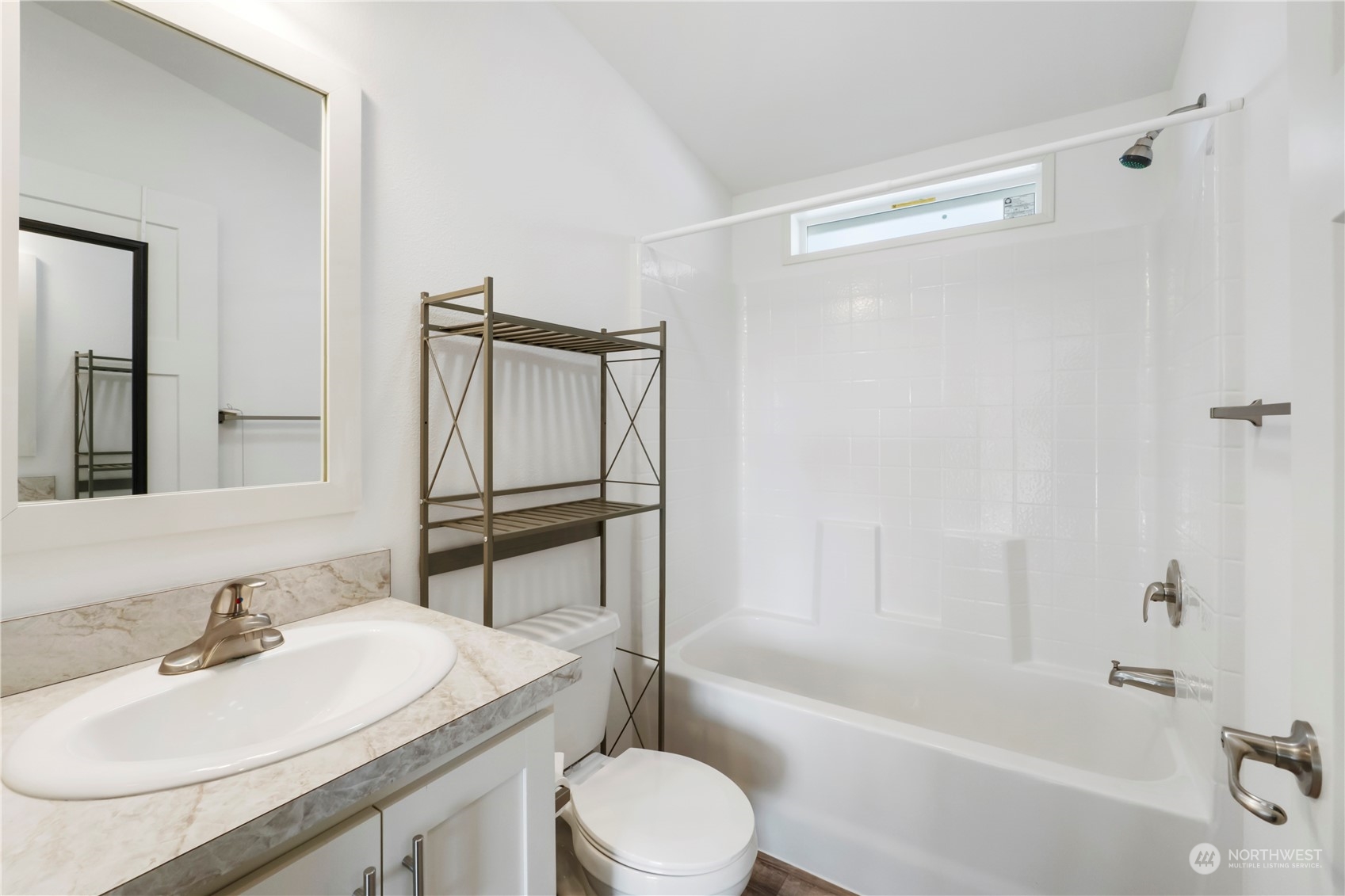 943 Pine Drive Enumclaw, WA 98022 - Photo 16 of 21 a bathroom with a sink toilet and shower