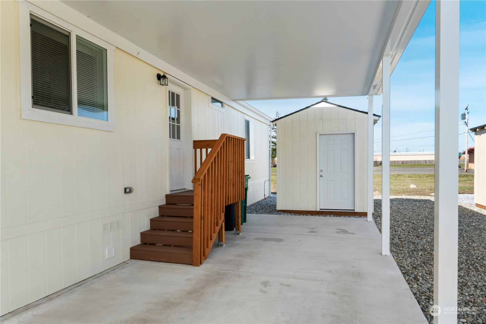 943 Pine Drive Enumclaw, WA 98022 - Photo 18 of 21 a view of entryway with stairs and wooden floor