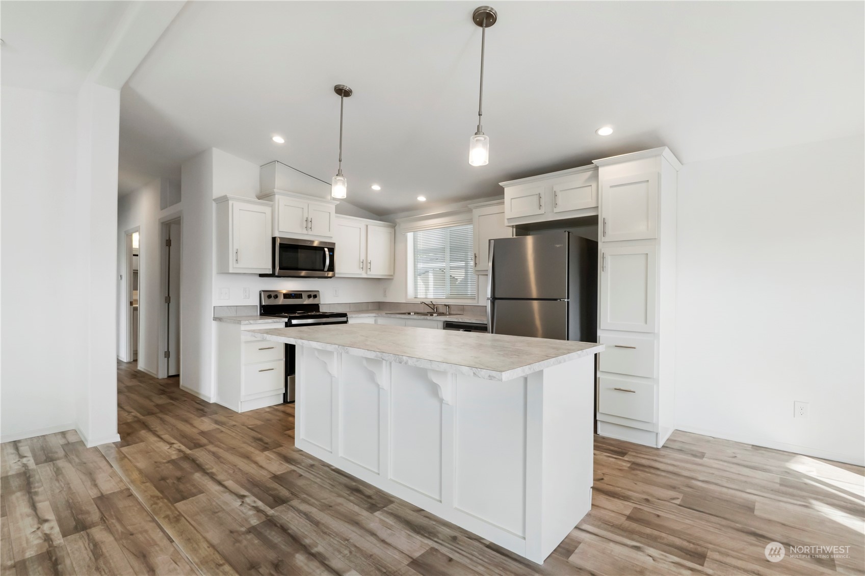 943 Pine Drive Enumclaw, WA 98022 - Photo 7 of 21 a kitchen with stainless steel appliances granite countertop a refrigerator a oven a sink and a refrigerator