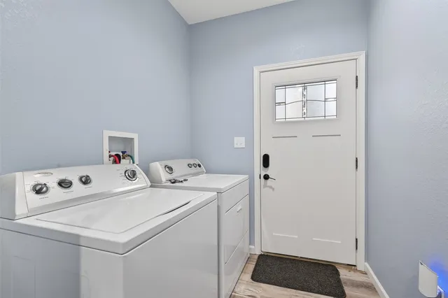 a view of a yard with swimming pool