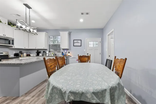 a bed room with a bed and a tv