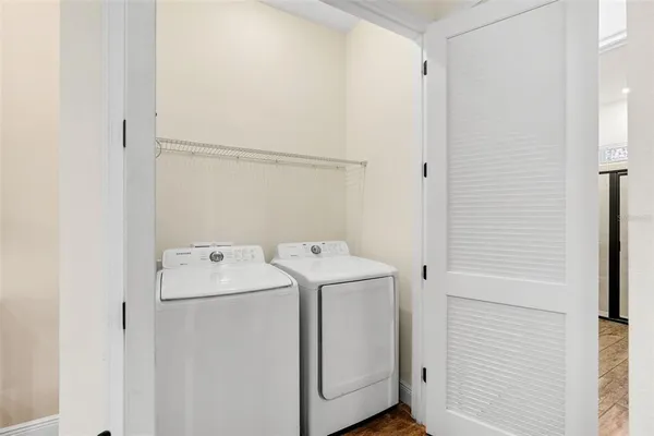 a utility room with dryer and washer