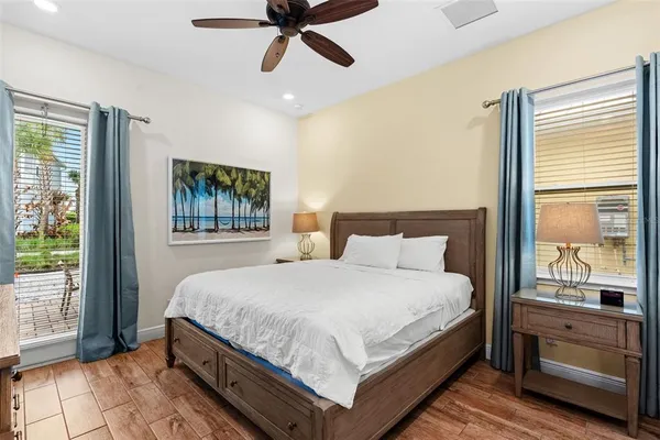 a bedroom with a large bed and a window
