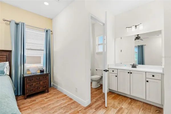 a spacious bathroom with a shower and a sink
