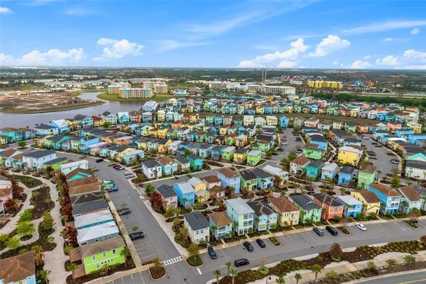 an aerial view of residential building and ocean