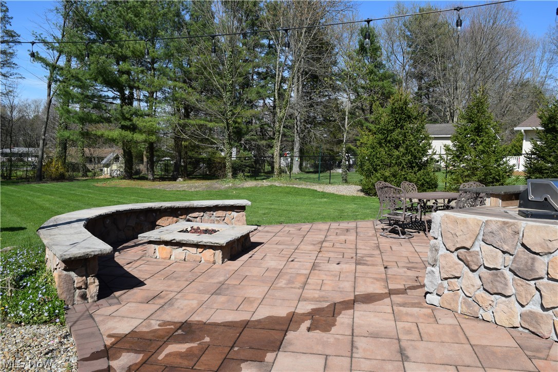 3285 Hemphill Road Barberton, OH 44203 - Photo 40 of 50 View of patio featuring an outdoor fire pit