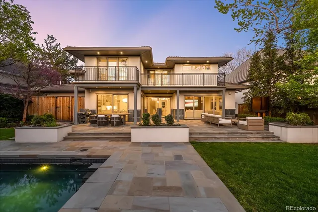 a front view of house with yard and outdoor seating