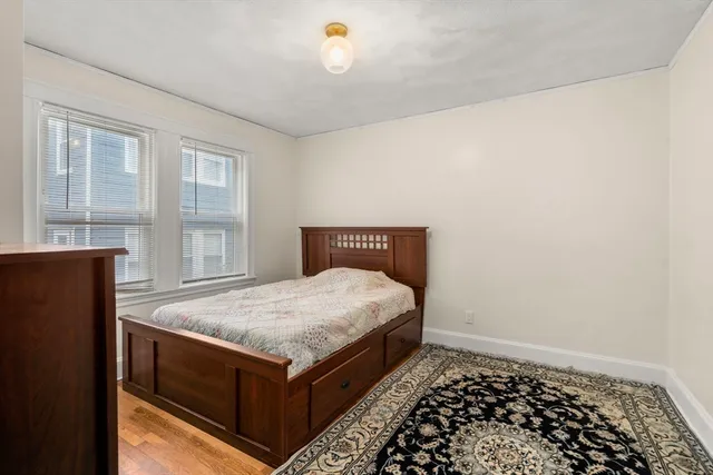 a room with bed and a window